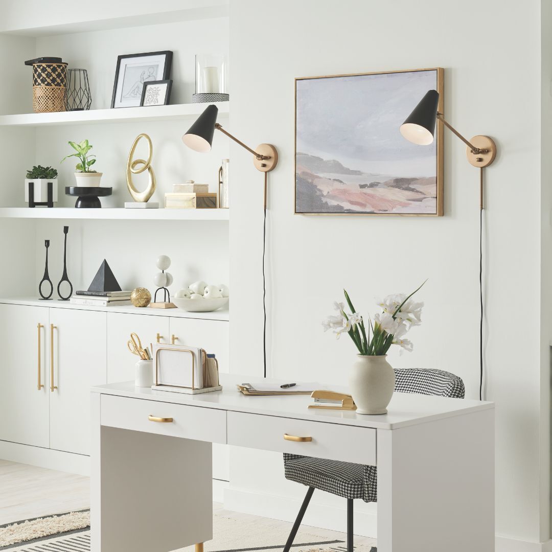 home office with adjustable lighting sconces above on wall home office with adjustable lighting sconces above on wall